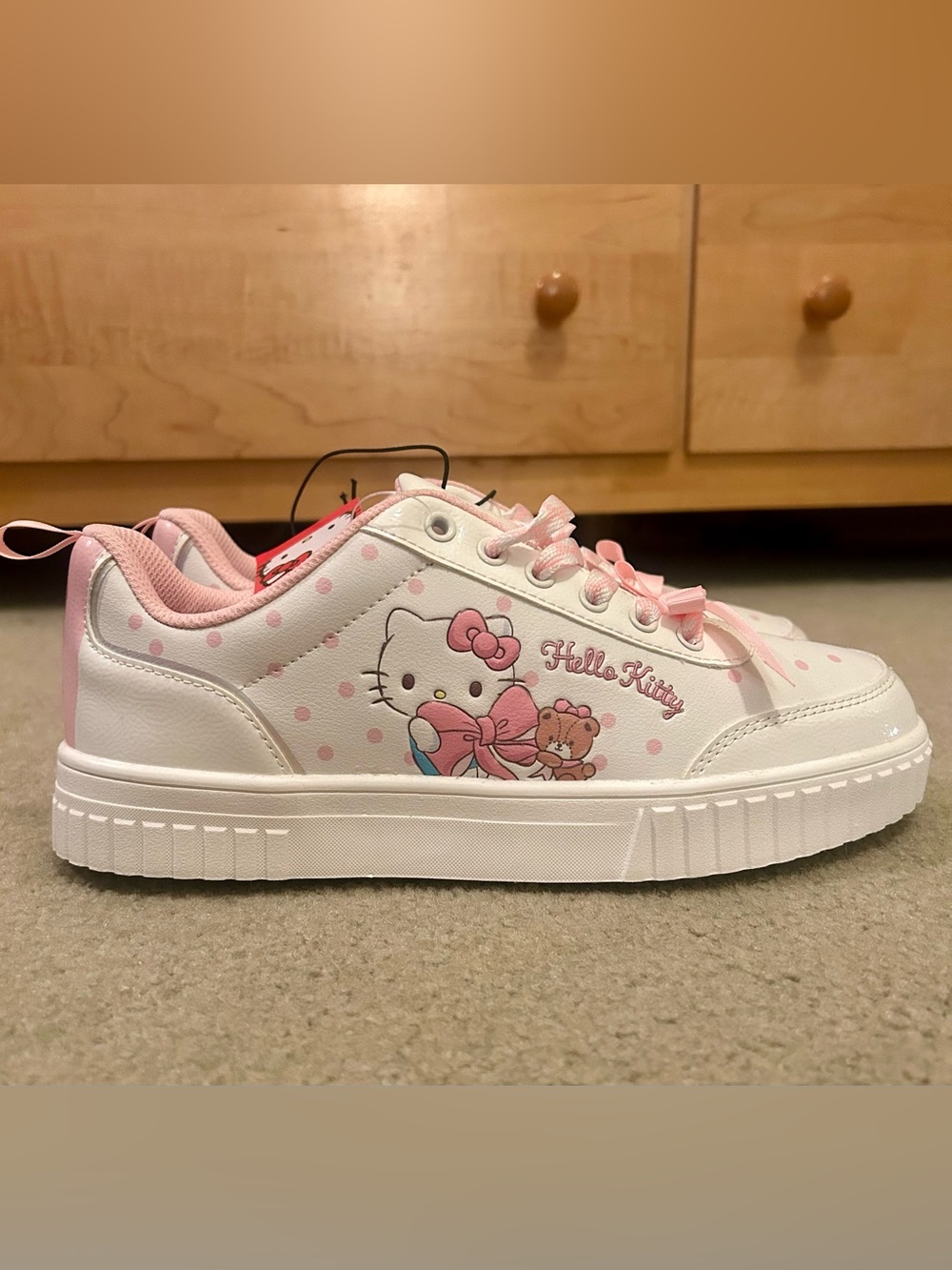 Hello Kitty by Sanrio Women’s White/Pink Polka Dot Bow Lace-Up Sneakers